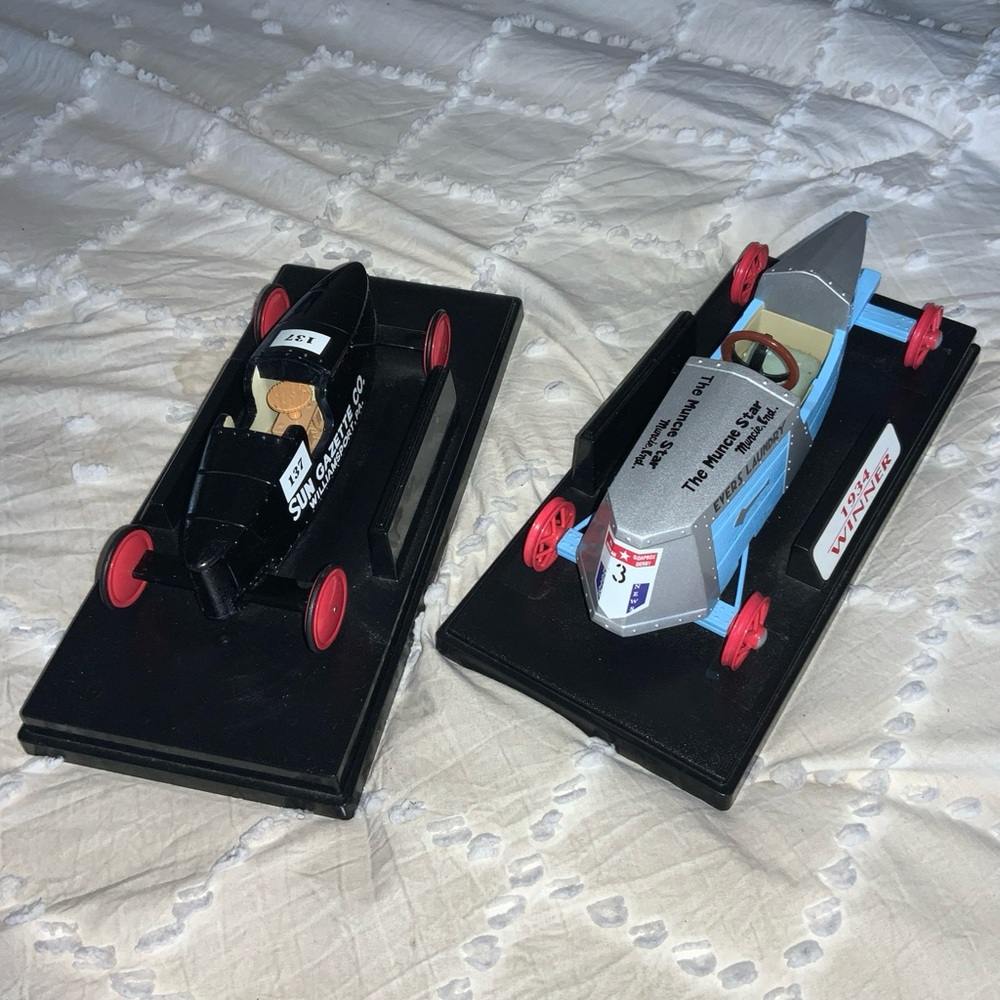 Two lots Downhill heroes nylint derby race car collection for shelf display.